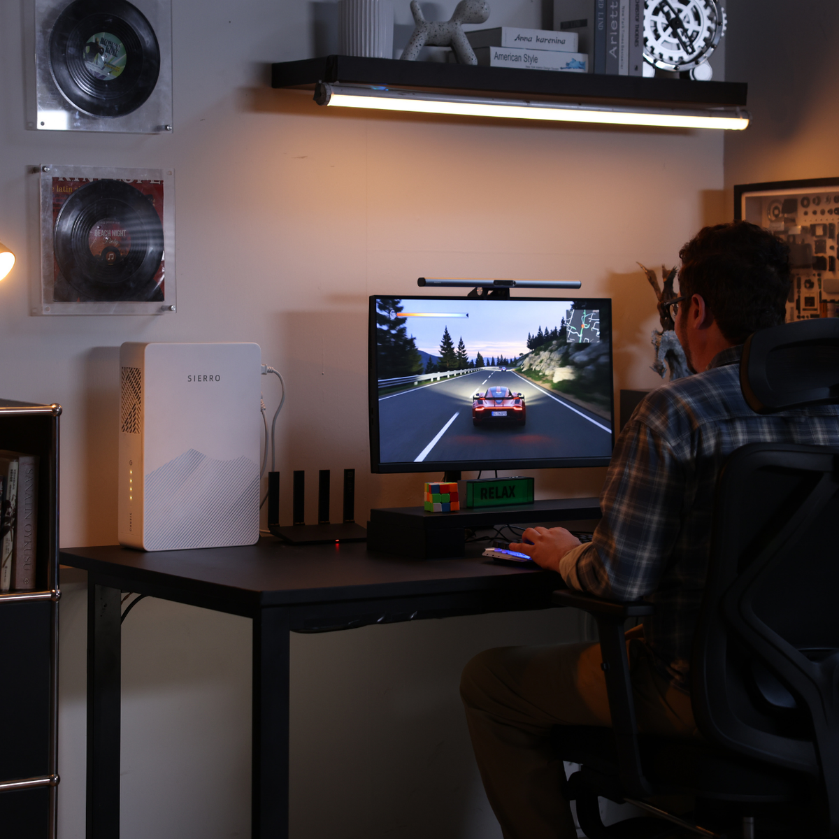 Sierro home backup beside a WiFi router and gaming computer