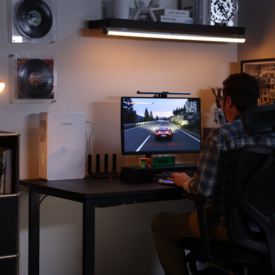 Sierro home backup beside a WiFi router and gaming computer
